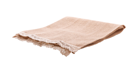Empty canvas napkin with lace, tablecloth isolated on white background. Can used for display or montage your products. Selective fokusの写真素材