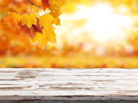 Wood table top on shiny bokeh gold backgroundの写真素材