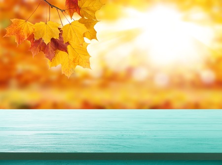 Wood table top on shiny bokeh gold backgroundの写真素材