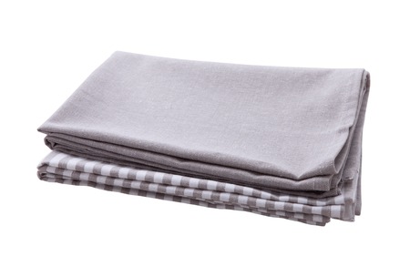 Napkin isolated on white. Multi-colored linen napkins for restaurant. Mock up for design. Top view.の写真素材