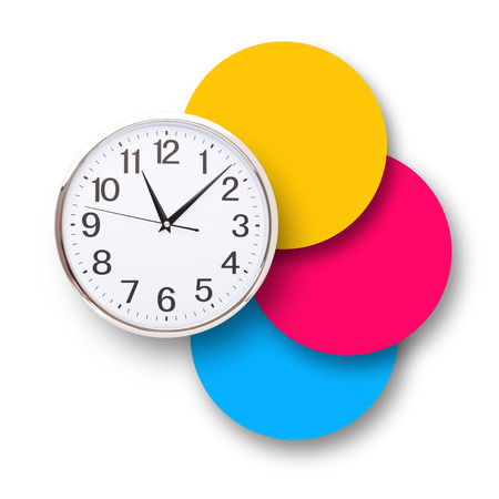 Time punctual second minute hour. Large clock on colorful background isolated. The concept of time.の写真素材