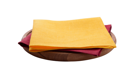 Napkins and Pizza board on wooden table isolated on white. Top view.の写真素材