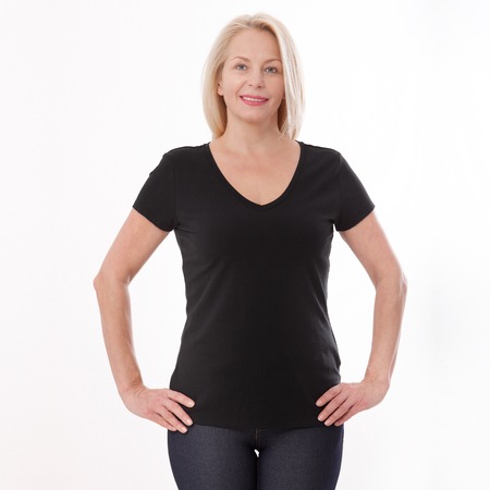 T-shirt design and people concept - close up of woman in blank black t-shirt, shirt front isolated. Mock up.の写真素材