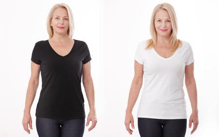 T-shirt design and people concept - close up of woman in blank black and white t-shirt, shirt front isolated. Mock up.の写真素材