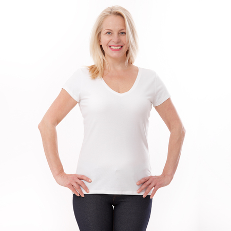 T-shirt design and people concept - close up of woman in blank white t-shirt, shirt front isolated. Mock up.の写真素材