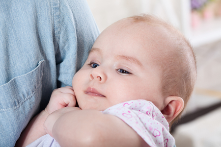 Baby with dad. family, parenthood and people concept - father with little baby at homeの写真素材