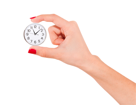 Human Hand Holding Clock Time isolated on whiteの写真素材
