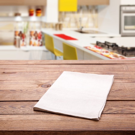 Tablecloth on the table and kitchen interior blurredの写真素材
