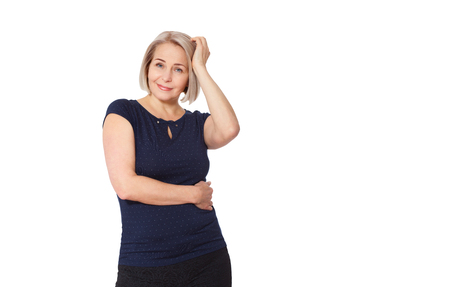 Happy woman emotionally posing in studio.の写真素材