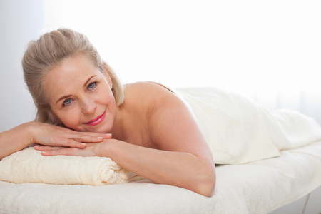 Portrait  of beautiful woman in spa environmentの写真素材
