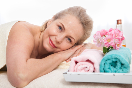 Portrait of beautiful woman in spa environmentの写真素材