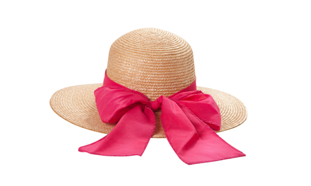 Pretty straw hat with ribbon and bow on whiteの写真素材