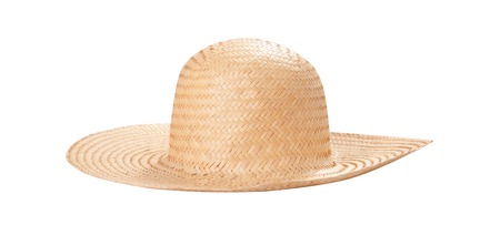 Pretty straw hat with ribbon and bow on whiteの写真素材