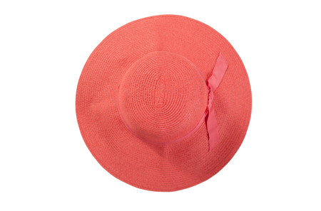 Pretty straw hat with ribbon and bow on whiteの写真素材