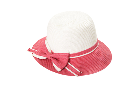 Pretty straw hat with ribbon and bow on whiteの写真素材