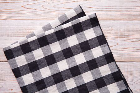 Napkin on white wooden table. Mock up for design. Top view.の写真素材
