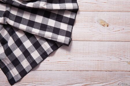 Napkin on white wooden table. Mock up for design. Top view.の写真素材