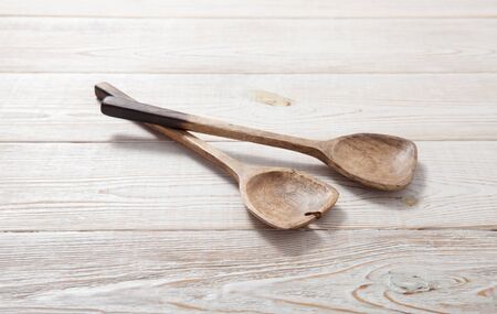 Wooden Kitchen Utensils. Wood spoons on table. Top viewの写真素材