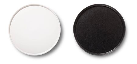 Black and white plate isolated on white background. Top view mock up.の写真素材