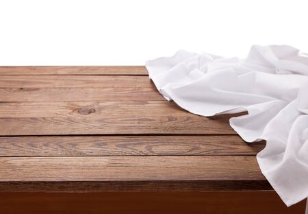 Kitchen towel on empty wooden table. Napkin close up top view mock up for design. Kitchen rustic background.の写真素材