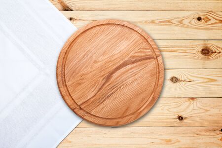Table cloth and pizza board on vintage wooden table. Top view mockupの写真素材