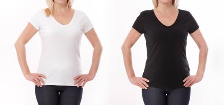 T-shirt design and people concept - close up of woman in blank black and white t-shirt, shirt front isolated. Mock up.の写真素材