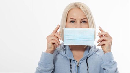 Face of a woman wearing a mask. Coronavirus and Air pollution concept.の写真素材