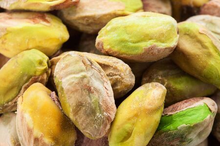 Pistachio nuts. Many pistachios as a background, texture top view closeupの写真素材