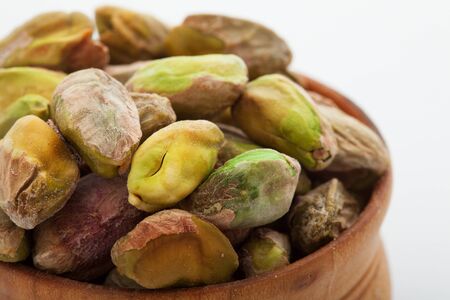 Pistachio nuts. Many pistachios isolated on white.の写真素材