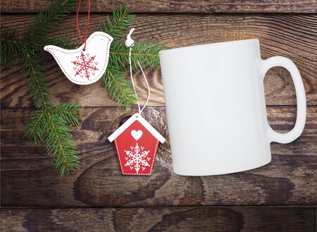 Winter mug mockup, blank white cup. Christmas background. Top viewの写真素材