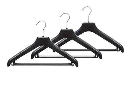 Closeup of black clothing hanger isolated over white backgroundの写真素材