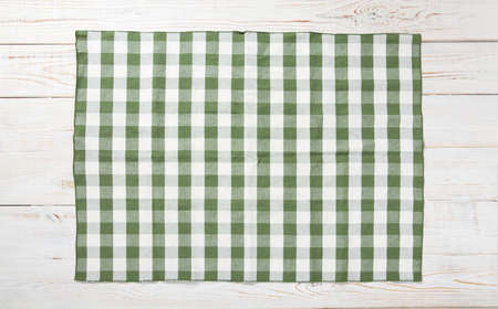 Kitchen towel napkin on wooden background. Top view. Maximum sharpness.の写真素材