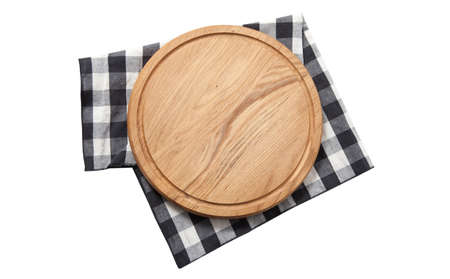 Empty pizza board and tablecloth on wooden deck table with napkinの写真素材