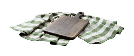 Empty pizza board and table cloth on wooden deck table with napkin. Kitchen background.の写真素材