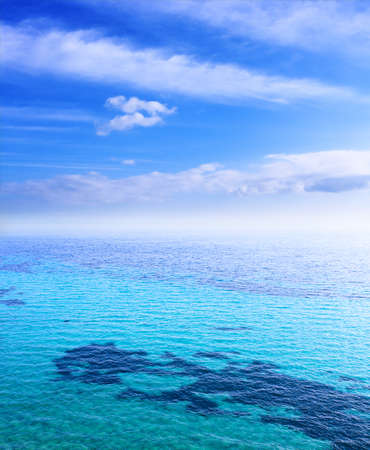 Sea beach blue sky sand sun daylight relaxation landscape viewpoint for design postcard and calendar in Crete, Greece,の写真素材