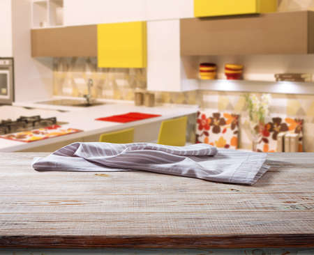 White napkin, table cloth on wooden deck mockup. Kitchen interior backgroundの写真素材