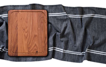 Cutting board with tablecloth, napkin isolated. top view mockupの写真素材