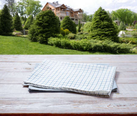 Kitchen towel, napkin on wooden desk. Top view mockupの写真素材