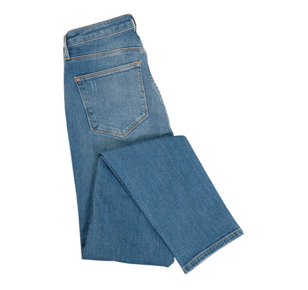Folded blue jean isolated on white background, close up.の写真素材