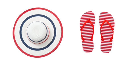 Beach accessories flip flops and hat. Summer resort objects collage isolated.の写真素材