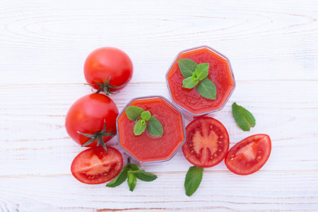 Tomato juice and tomato vegetables top viewの写真素材