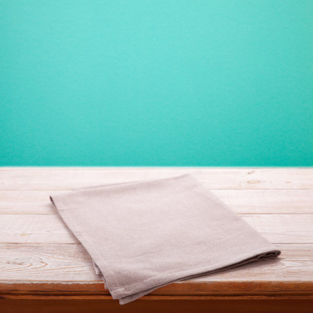 Stylish Kitchen Background White Napkin on Wooden table in perspective. Get an exquisite experience rustic chic and blue background.の写真素材