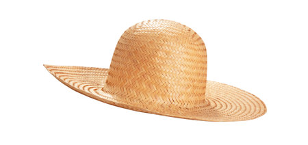 Pretty straw hat with ribbon and bow on white background. Beach hat top view isolatedの写真素材