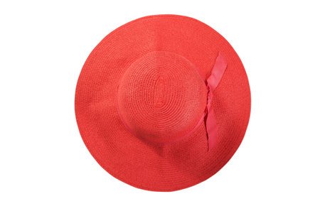 Pretty straw hat with ribbon and bow on white background. Beach hat top view isolatedの写真素材