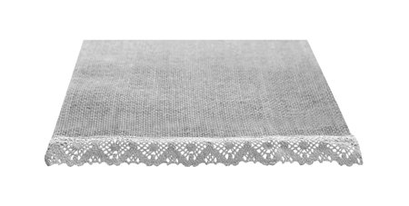 Canvas napkin with lace, natural burlap runner perspective isolated on white. Can used for display or montage product. Selective fokusの写真素材