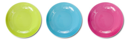 Top view of empty colorful plates with shadow isolate on white backgroundの写真素材