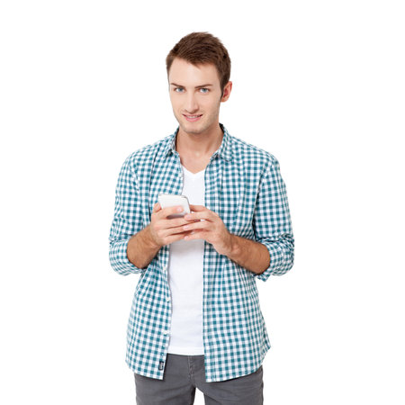 Young urban professional man using smart phone. Businessman holding mobile smartphone using app texting sms message isolated on white backgroundの写真素材