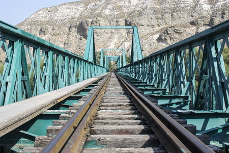 Old green train bridgeの写真素材