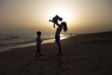 Playing on the beachの写真素材