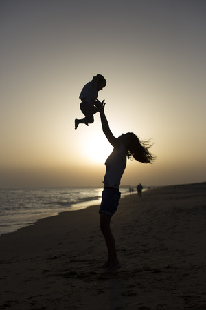 Playing on the beachの写真素材